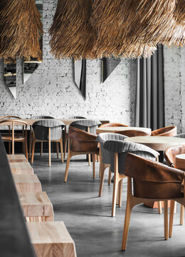 Stylish bar interior with thatched lamps