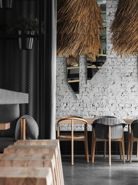 Stylish bar interior with thatched lamps