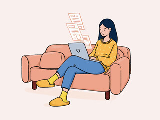 Woman browsing online messages on laptop