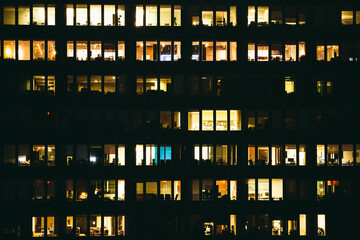 Shiny windows of office building at night