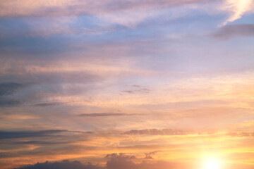 Beautiful bright sunset on the sky, sky with clouds in the evening