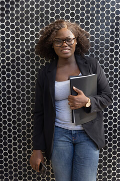 business woman plus size portrait looking at camera, smiling