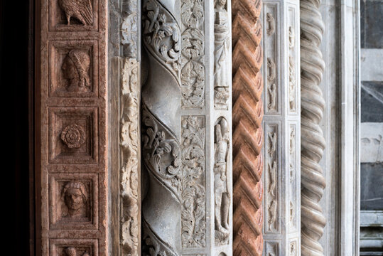 Layers of texture and marble stone decor on columns. 