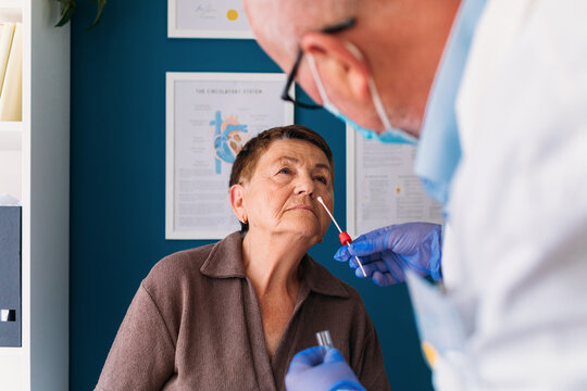 Doctor Taking Coronavirus Sample From Patient