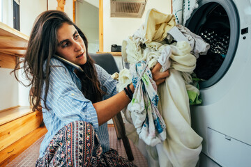 young woman doing household chores