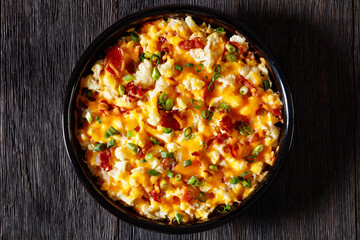cauliflower bacon cheese casserole in baking dish