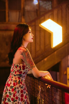 portrait of an Asian woman at night