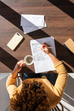 Female accountant filling financial papers