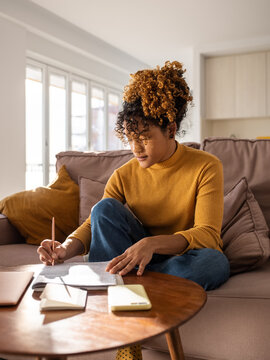 Hispanic student doing homework task