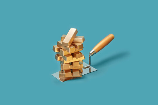 Gold ingots pile on masonry trowel.