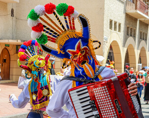 The Christmas parade Pase del Nino (Traveling Child) at historic center of city Cuenca....