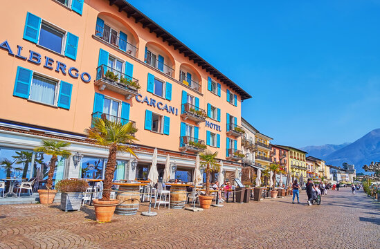 Outdoor restaurants and bars on embankment of Lake Maggiore, on March 28 in Ascona, Switzerland