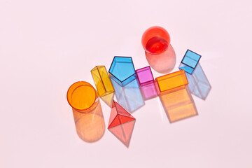 Geometric figures on beige background.