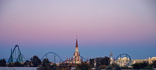 beautiful castle of the park of legends against the background of a lilac sky. Antaly