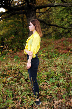 The young woman in a yellow blouse