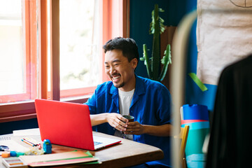 Asian Man Working in Office