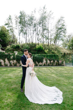 Bride and groom spending time in yard 