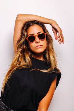 Stylish young woman in sunglasses