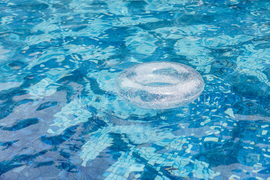 inflatable ring floating in swimming pool.