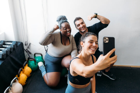People Taking Selfie in Gym