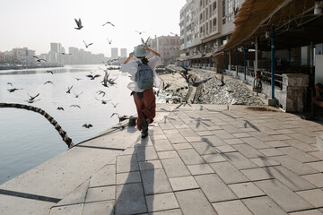A woman in an old town of Dubai