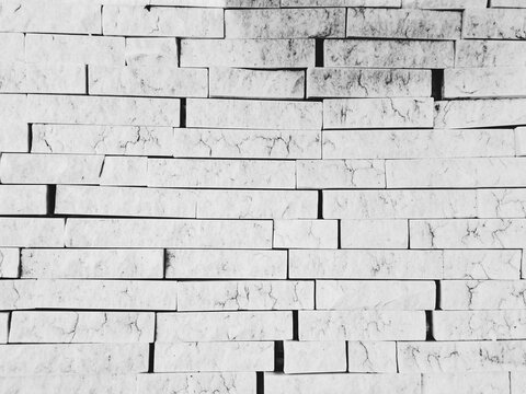Irregularly placed stone marble bricks 