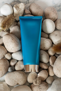 Blue plastic tube on rocks