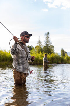 Fly Fisherman standing  Provo River Utah in United States 
