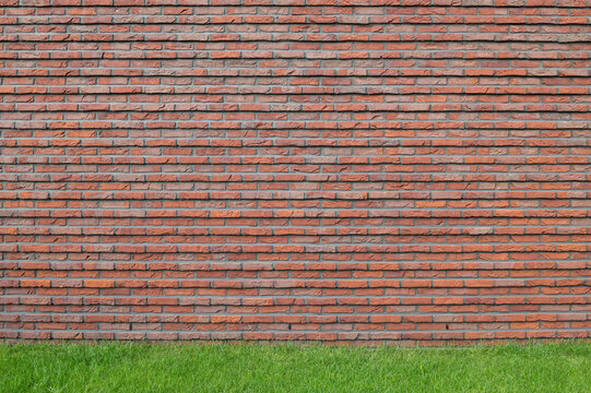 brick wall and lawn