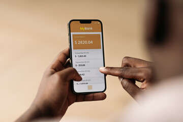 Man Checking Bank Account on Phone 