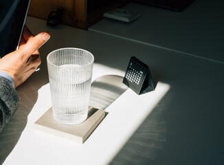 Glass of Water on Office Desk