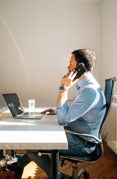 Businessman Talking on The Phone 