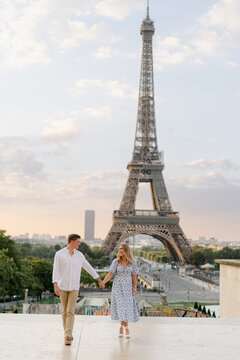 couple standing by Eiffel tower
