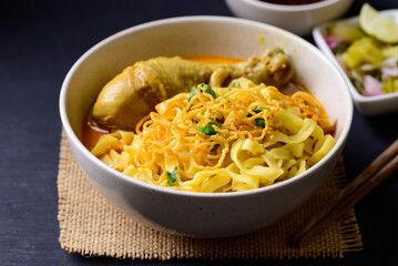 Northern Thai food (Khao Soi), Spicy curry noodles soup with chicken, Local Thai food