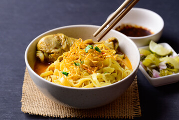 Northern Thai food (Khao Soi), Spicy curry noodles soup with chicken, Local Thai food