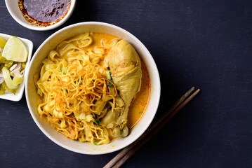 Northern Thai food (Khao Soi), Spicy curry noodles soup with chicken, Local Thai food