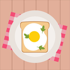 Simple flat white toast with a fried egg and greens on a white plate and red napkin and brown wooden table background