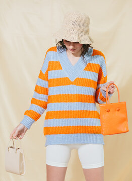 Fashionable woman with mini bag