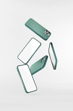 Smartphones floating on a white backdrop