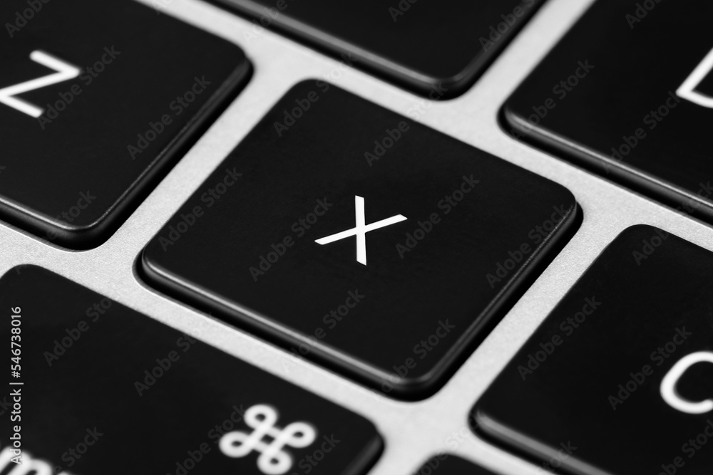 Aufkleber closeup shot of a grey keyboard layout with black keys and white font