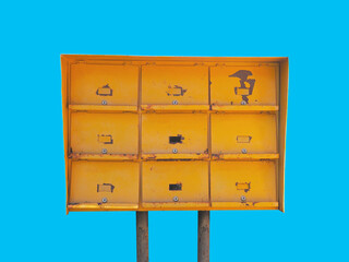 old rusty yellow metal post mailbox isolated. - 546740600