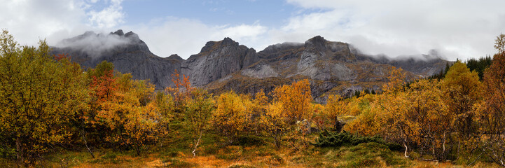 Bjorntinden Nusfjord autumn trees Lofoten Islands