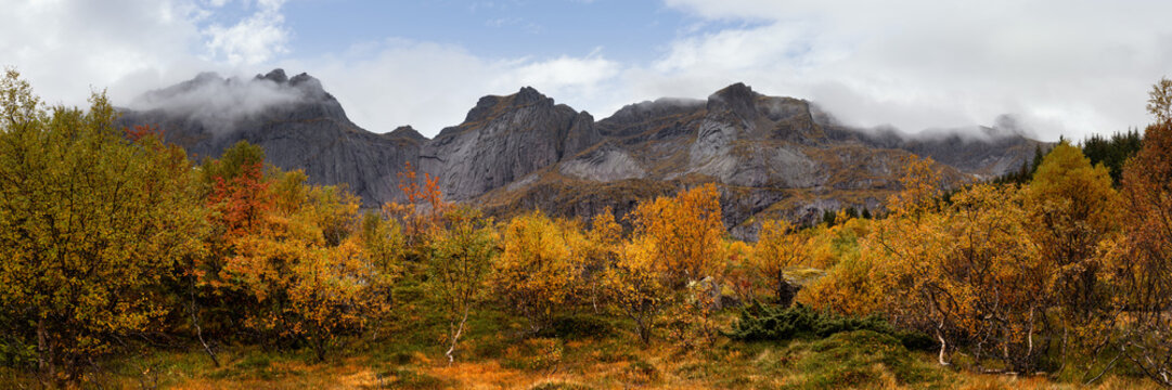 Bjorntinden Nusfjord autumn trees Lofoten Islands