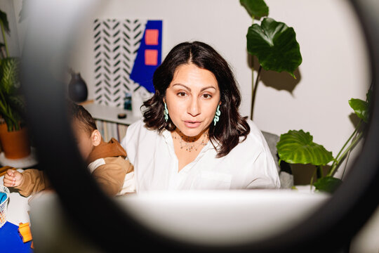 Publicist PR woman in videoconference. Direct flash