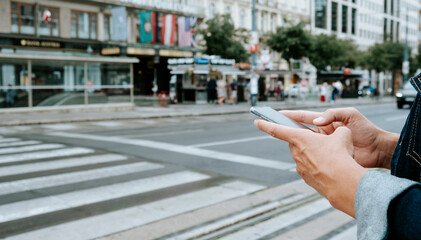 man uses his smartphone on the street, banner format