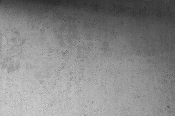 Gray concrete wall. The texture of the old plaster wall is interesting. Design background.