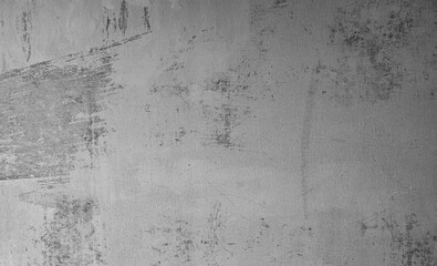 Gray concrete wall. The texture of the old plaster wall is interesting. Design background.