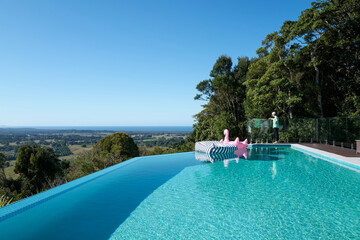 Infinity pool with scenic view of Hinterland