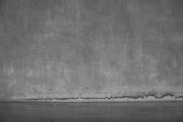 Gray concrete wall. The texture of the old plaster wall is interesting. Design background.