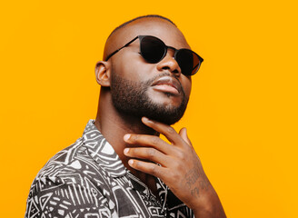 Stylish black man in trendy sunglasses